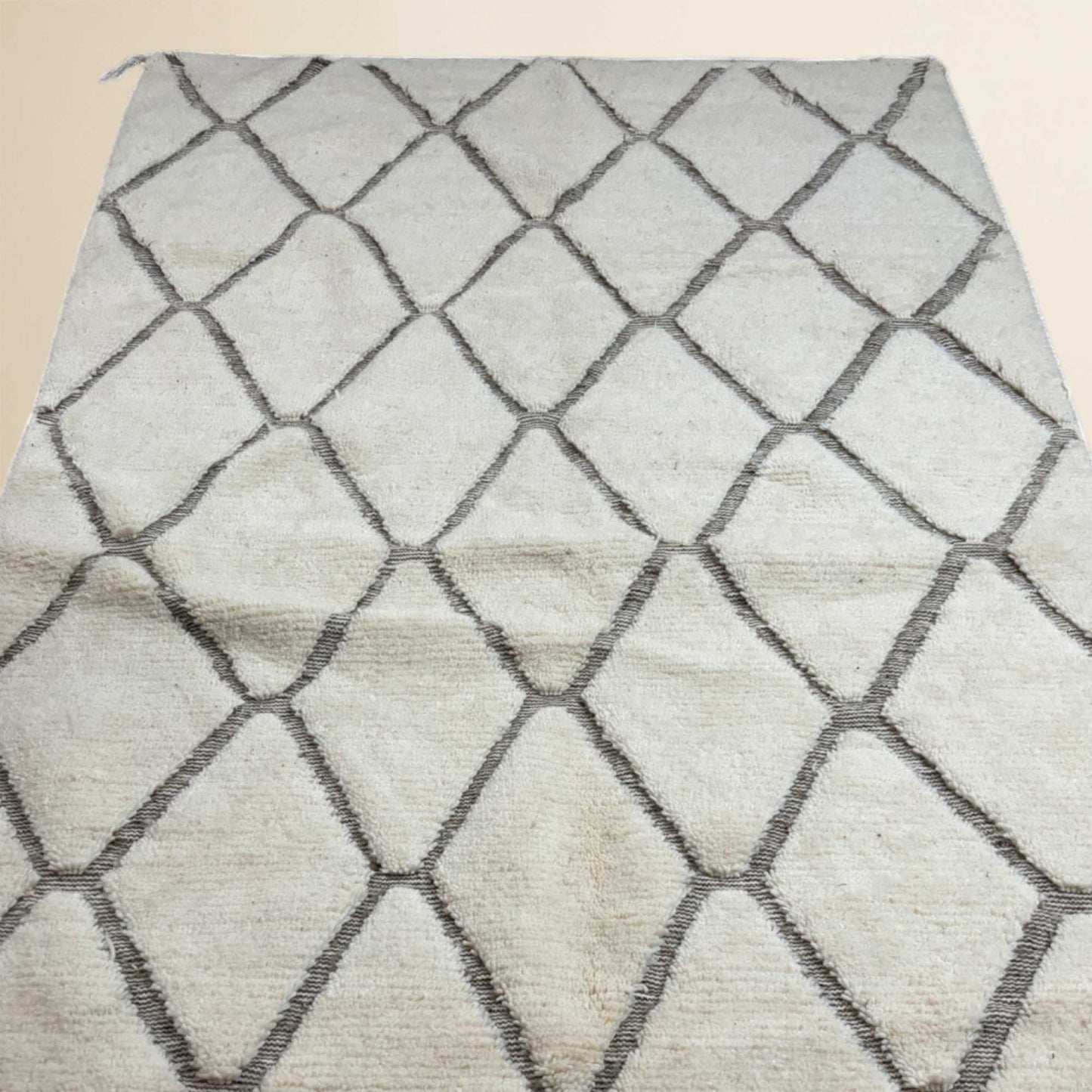 Beni Ouarain Berber rug • Brown diamond pattern on a beige background